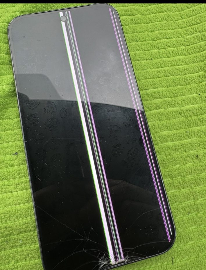 Google Pixel 9 Pro XL screen with damaged OLED showing vertical lines before replacement in Panorama NW Calgary