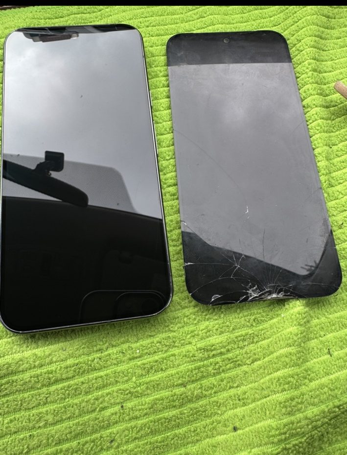Repaired Google Pixel 9 Pro XL next to the damaged removed screen