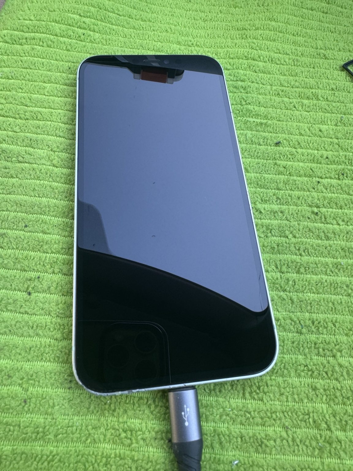 iPhone 12 with newly replaced front screen following mobile repair in Walden SE Calgary