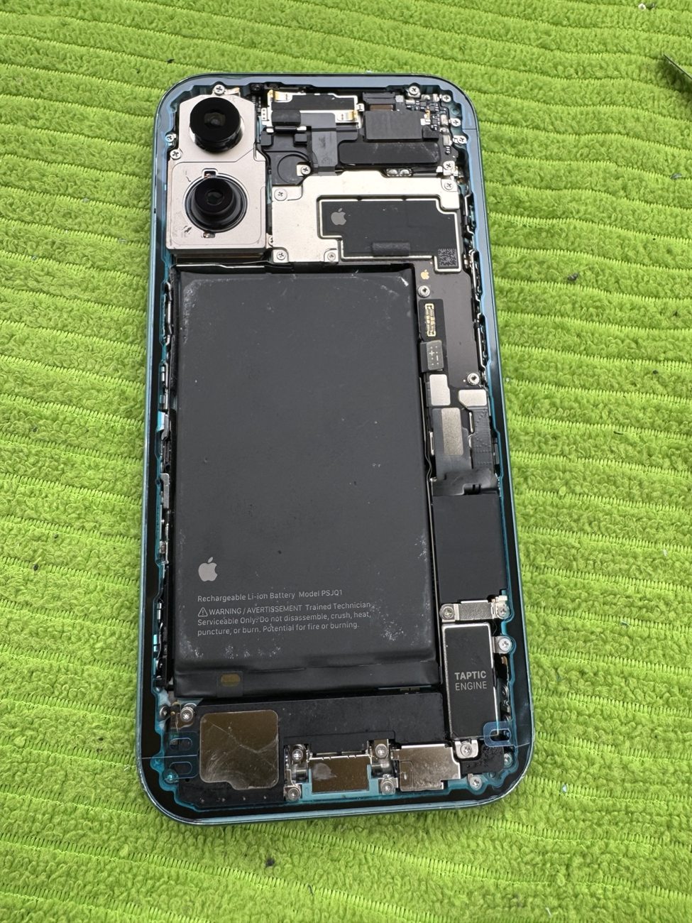 Blue iPhone 16 opened for back glass replacement in Erlton SW Calgary