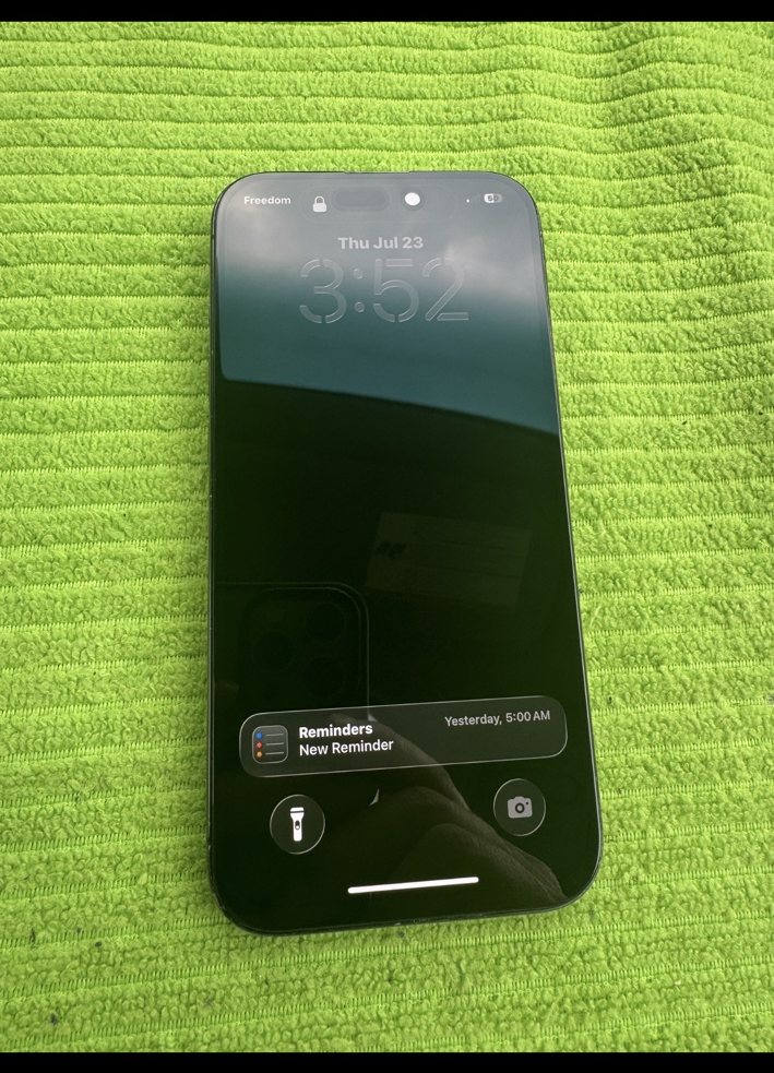 iPhone 15 Pro front screen after replacement showing restored display in NE Calgary